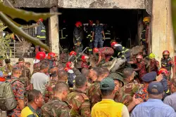 A Bangladesh Air Force training jet crashes into a Dhaka school, killing at least 19